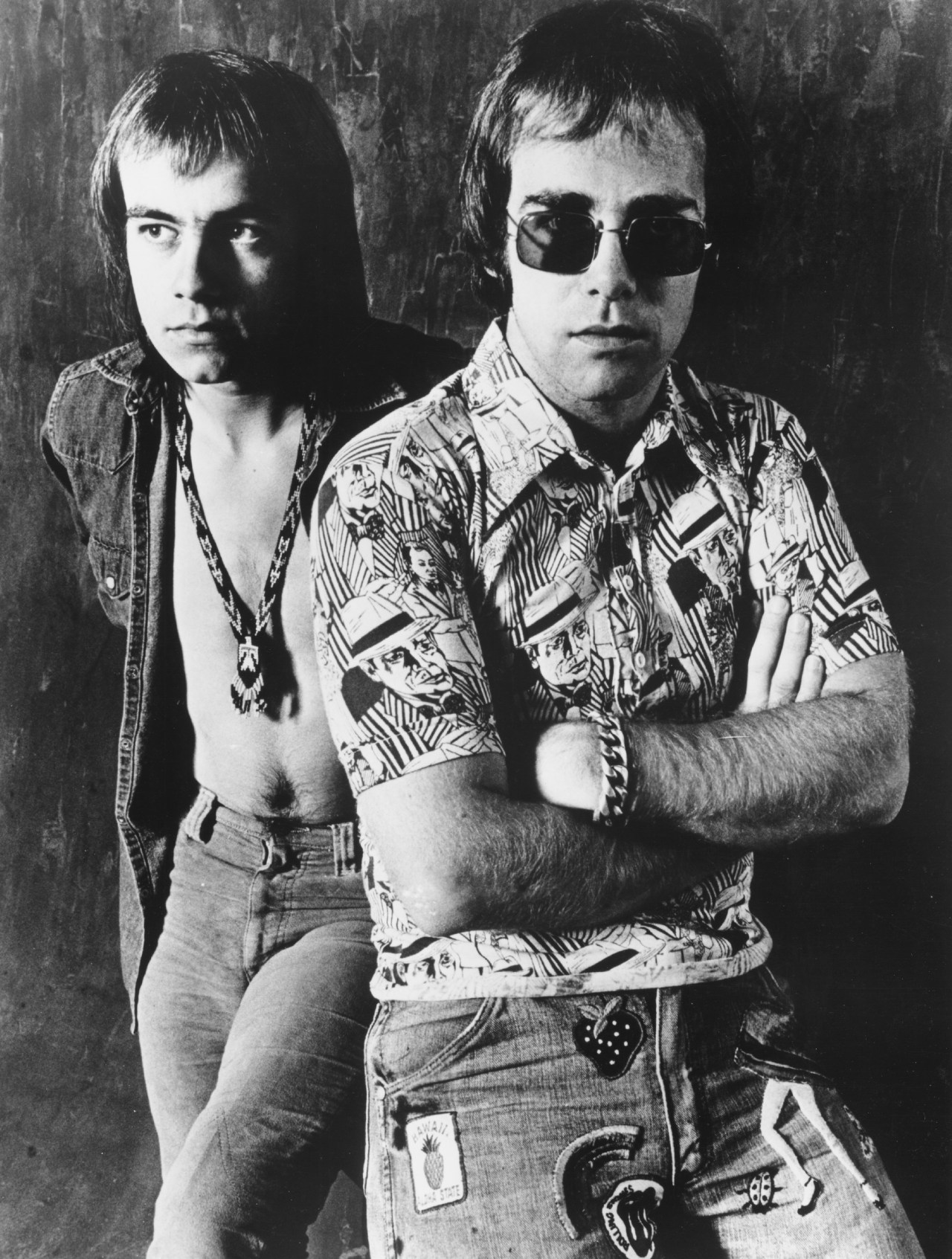 Elton John and Bernie Taupin posing for a portrait in London, circa 1971