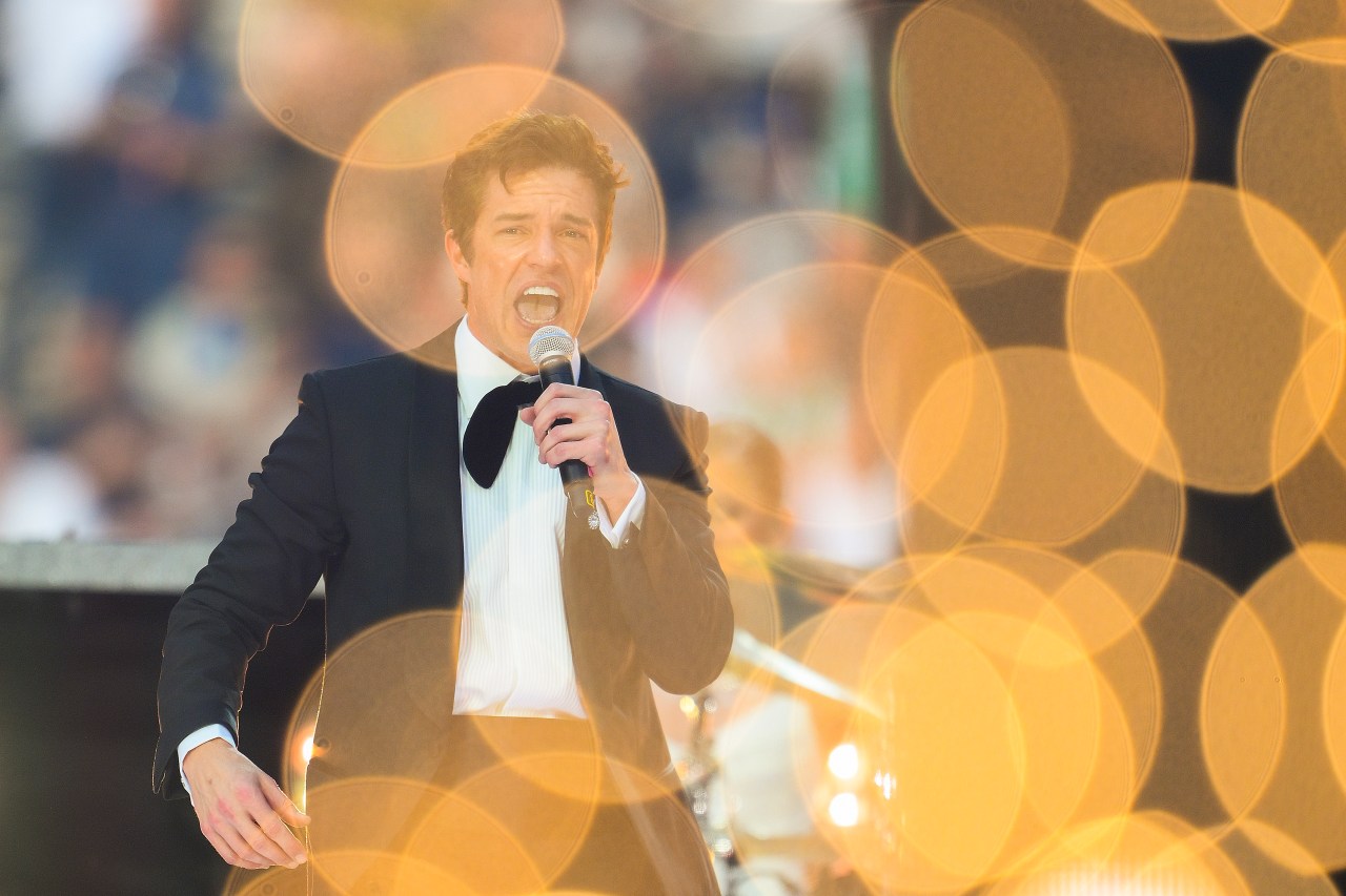 Brandon Flowers of The Killers performing on stage at the UEFA Champions League Final 2026 pre-match ceremony at Puskas Arena in Budapest