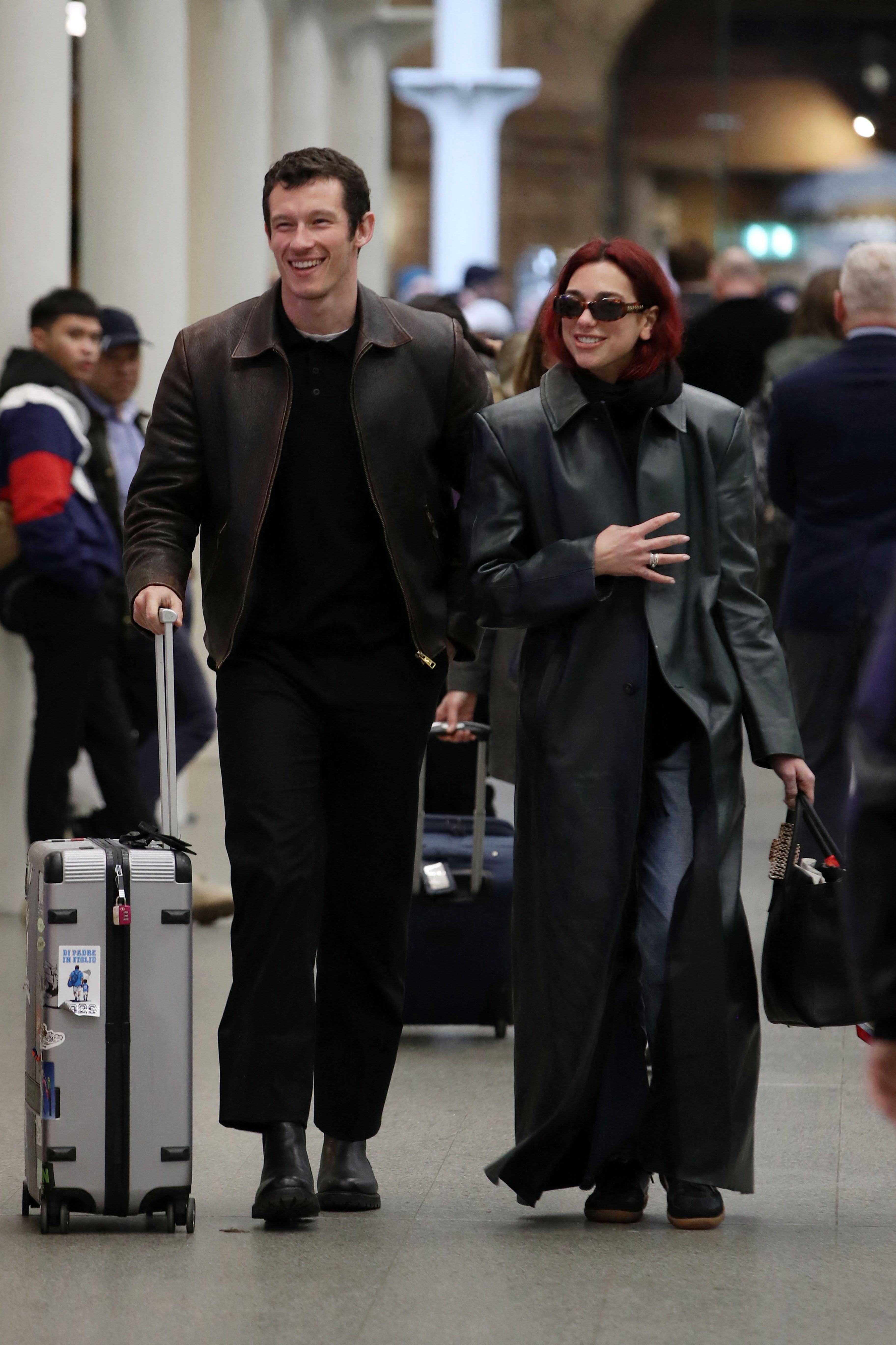 Dua Lipa and Callum Turner arriving back in the UK from Paris.