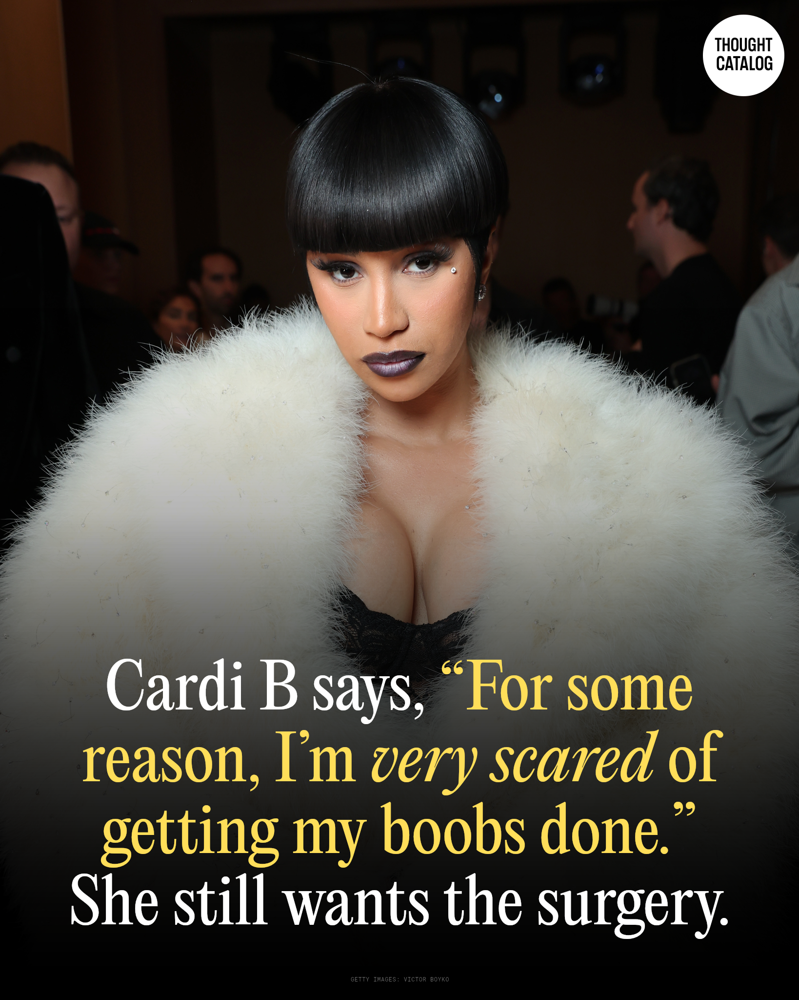 Cardi B posing at a public event