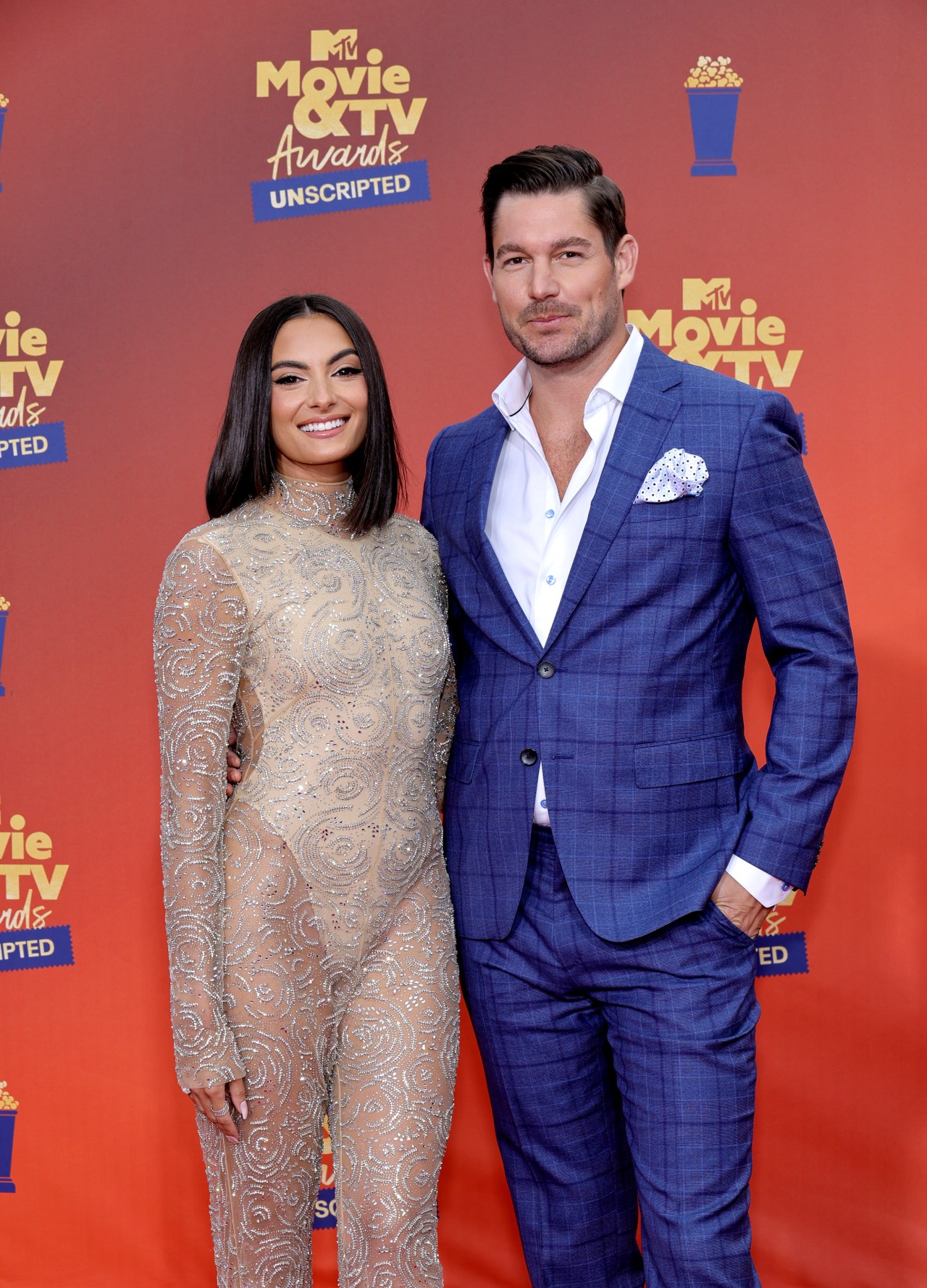 Paige DeSorbo and Craig Conover posing together at the 2022 MTV Movie & TV Awards: UNSCRIPTED in Santa Monica