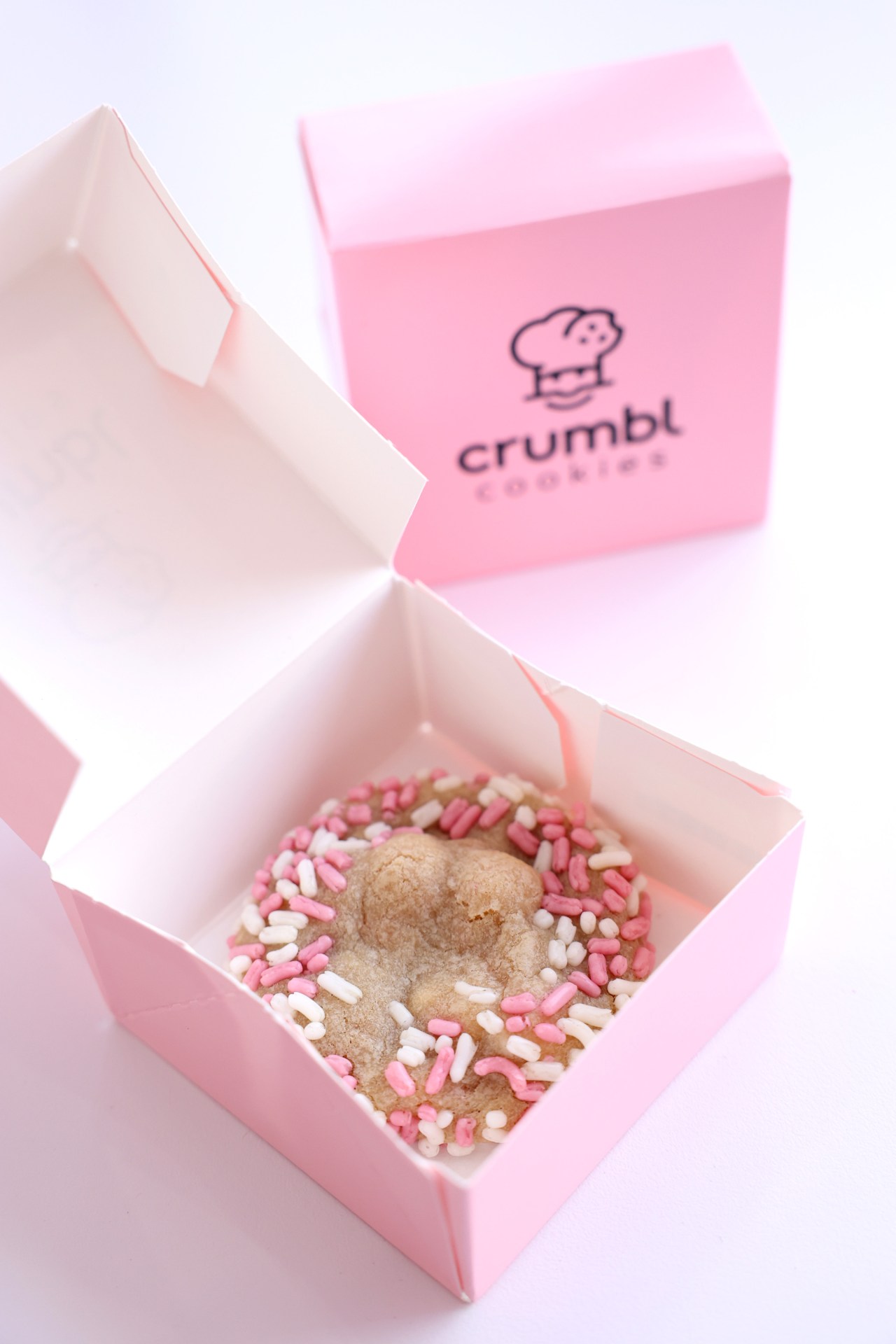 Close-up of a Crumbl cookie at a food festival event in New York City