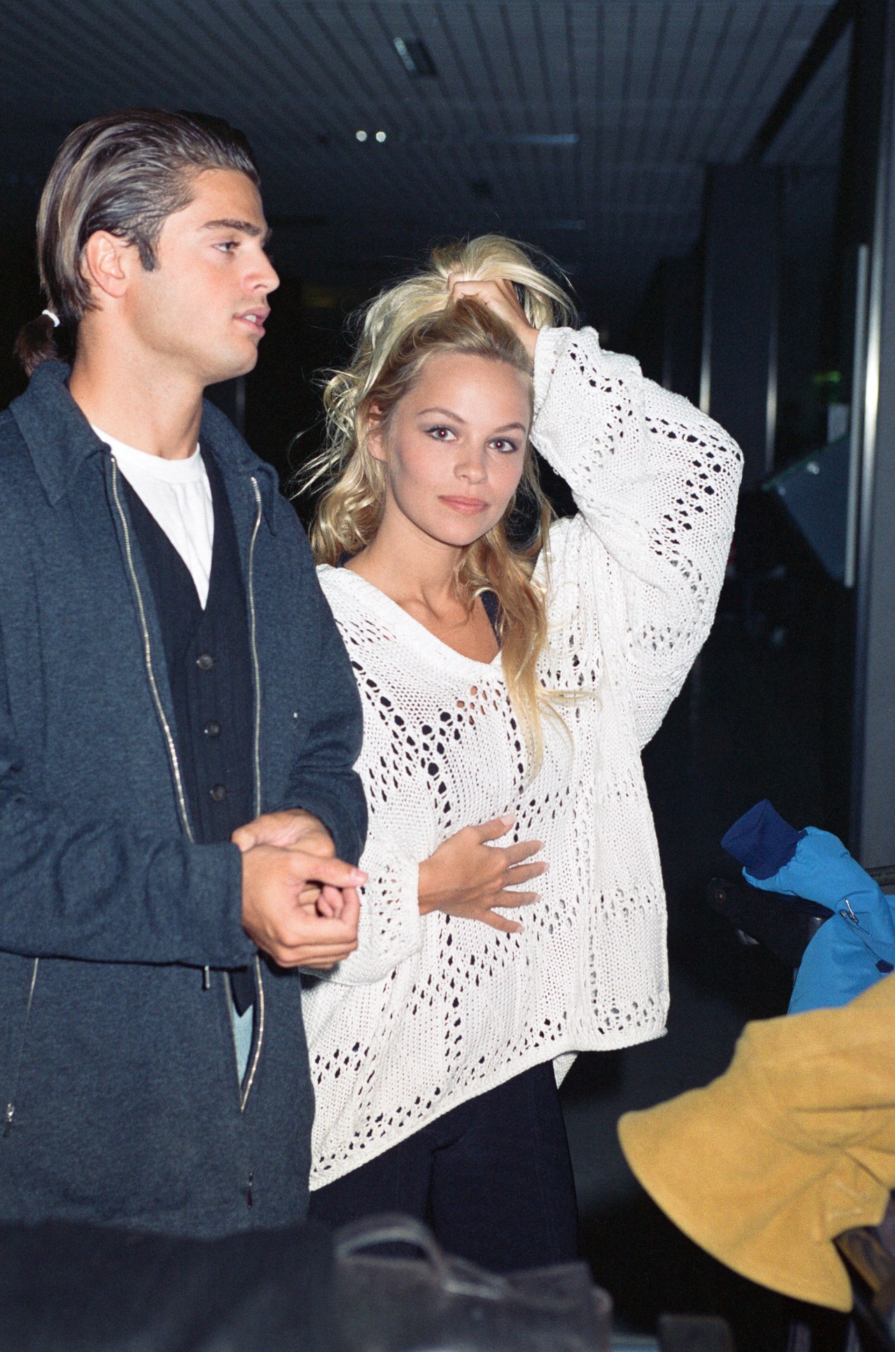 Pamela Anderson and David Charvet at London Heathrow Airport in January 1993