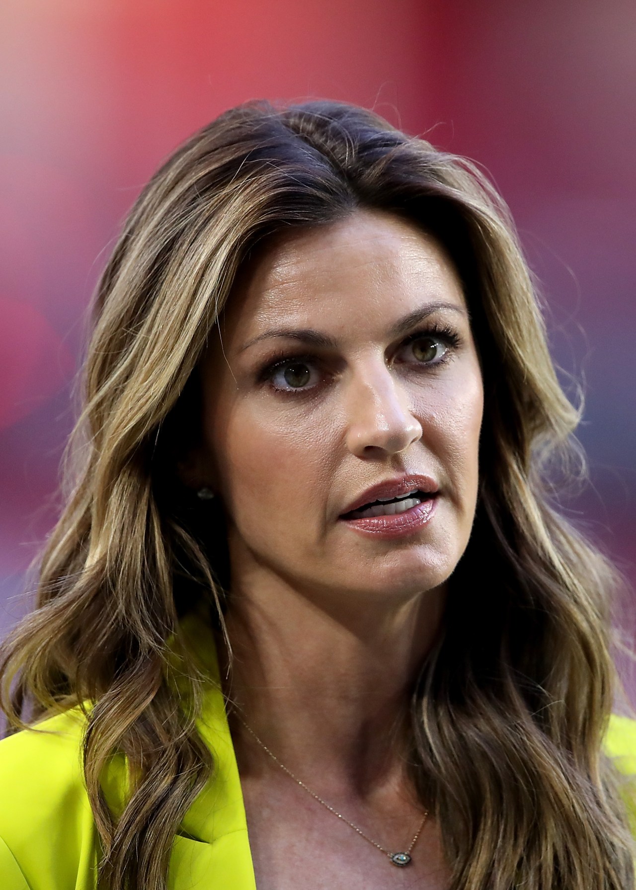 Erin Andrews standing on the sidelines at State Farm Stadium before an NFL game