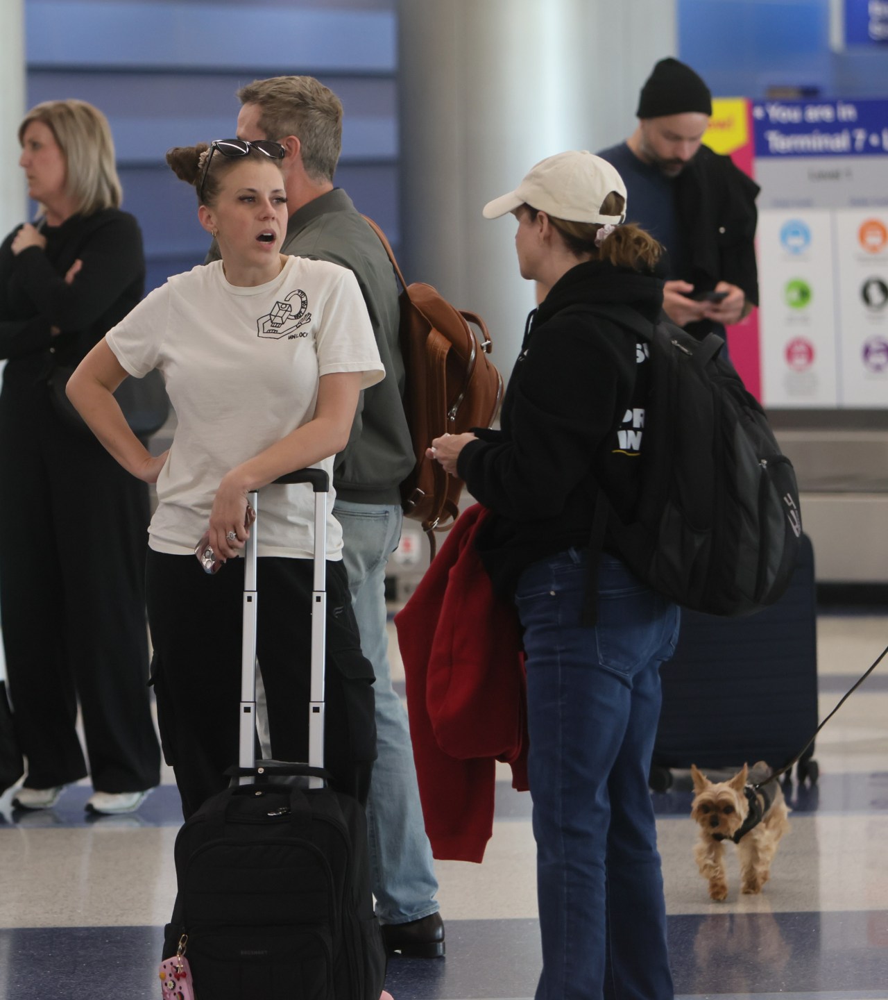 Jodie Sweetin, Andrea Barber, and Scott Weinger arriving at a Los Angeles airport