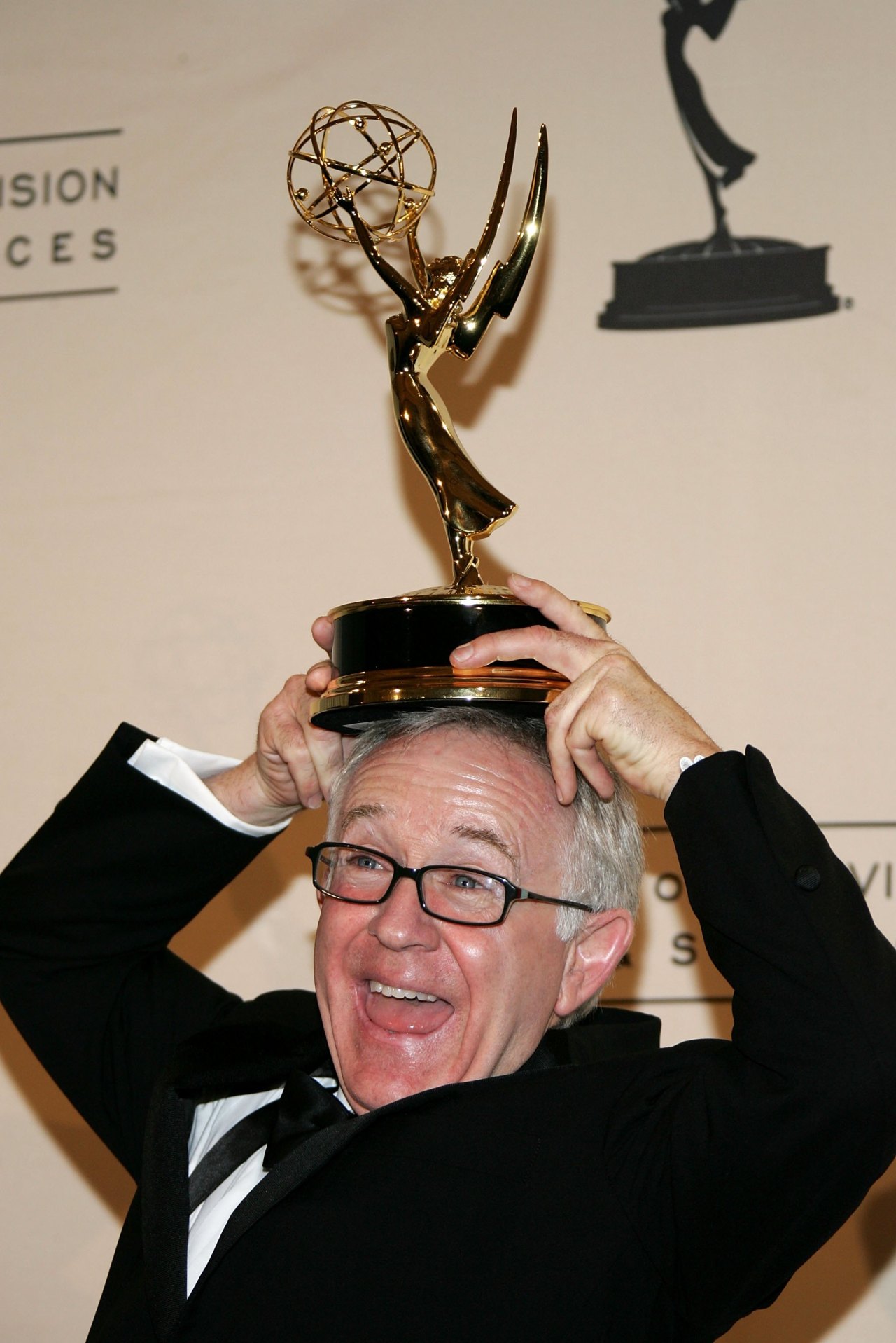 Leslie Jordan holding his Emmy award in the press room at the 2006 Creative Arts Awards at the Shrine Auditorium in Los Angeles