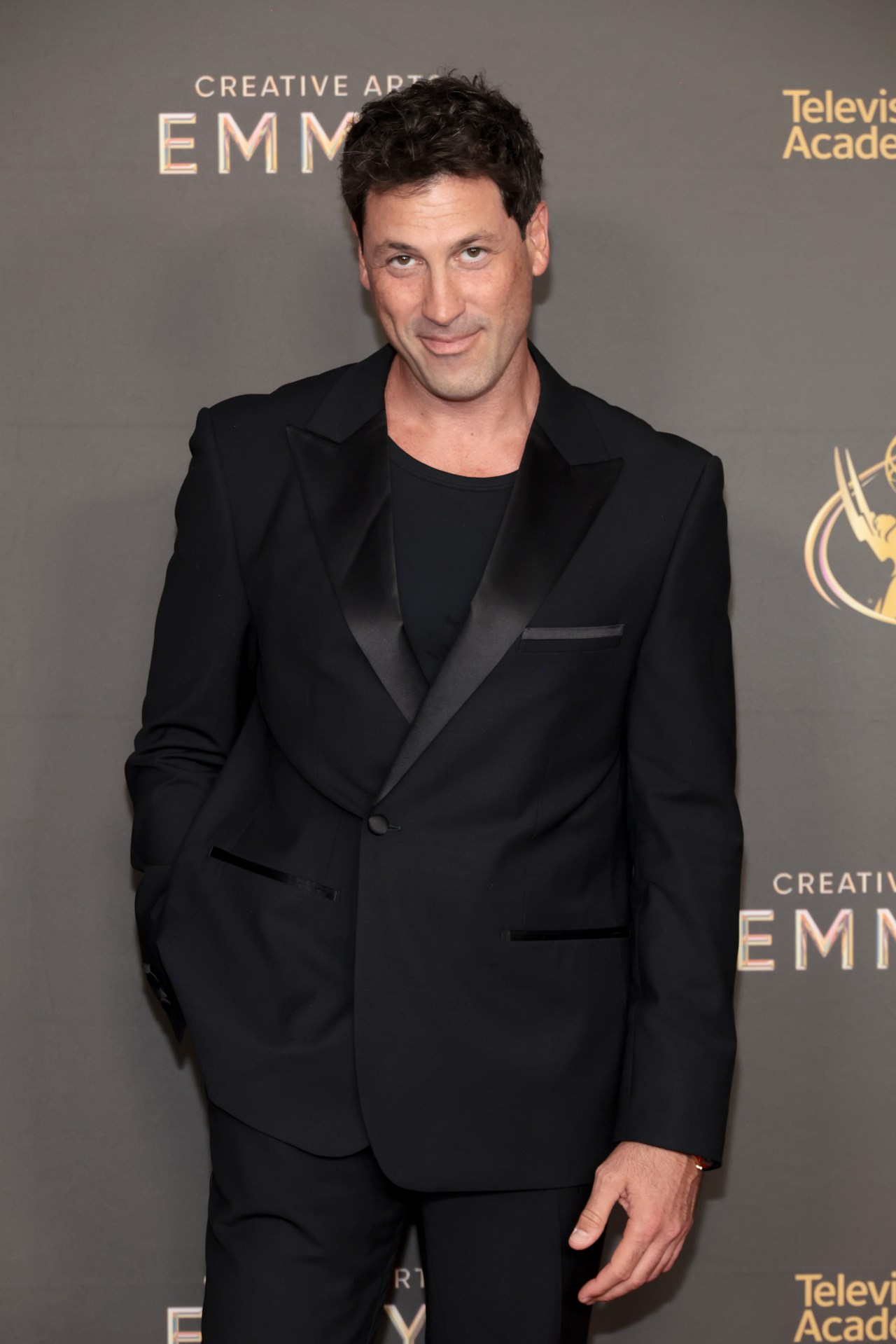 Maksim Chmerkovskiy at the 76th Creative Arts Emmys Winner's Walk at Peacock Theater in Los Angeles