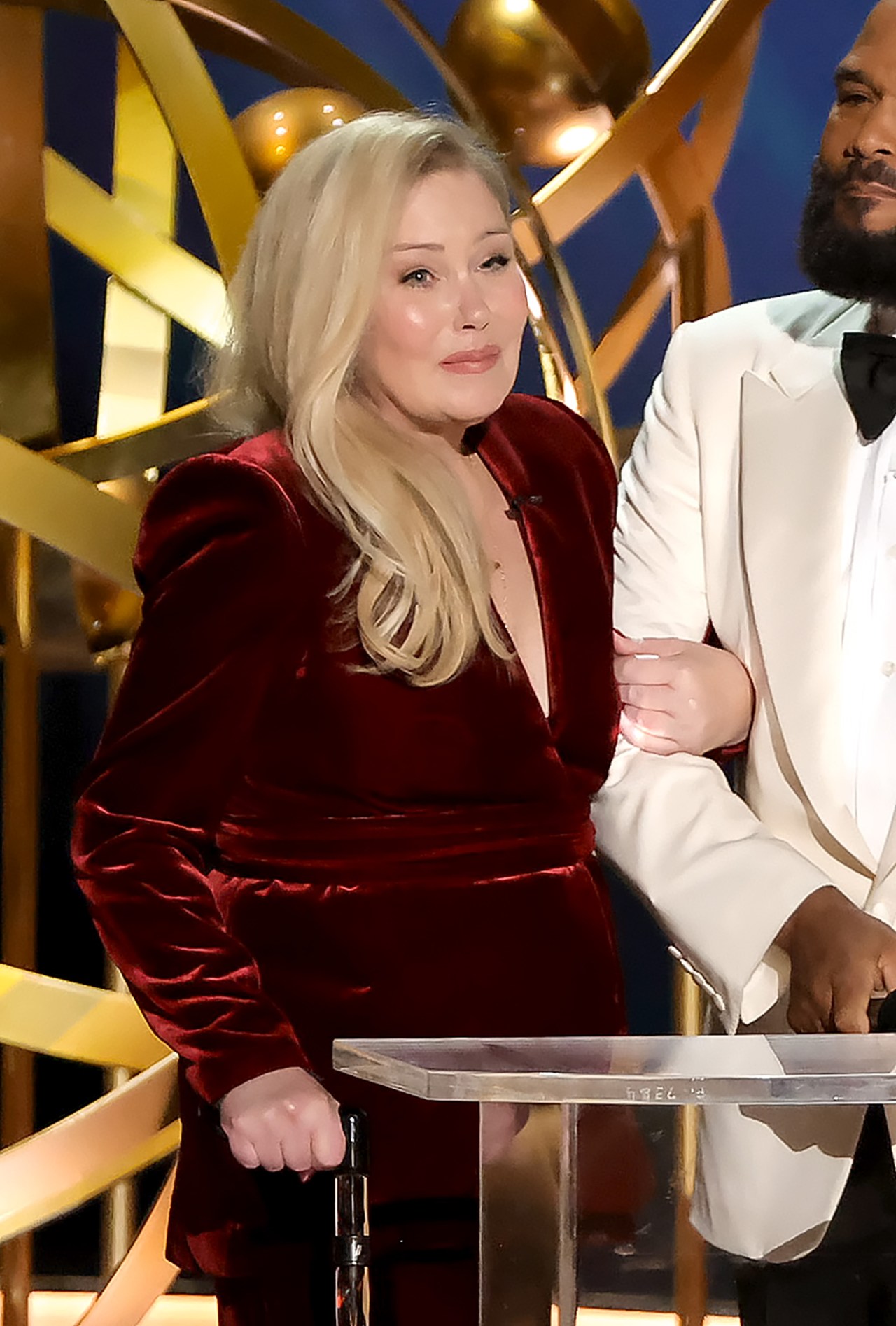 Christina Applegate speaking onstage at the 75th Primetime Emmy Awards at Peacock Theater in Los Angeles
