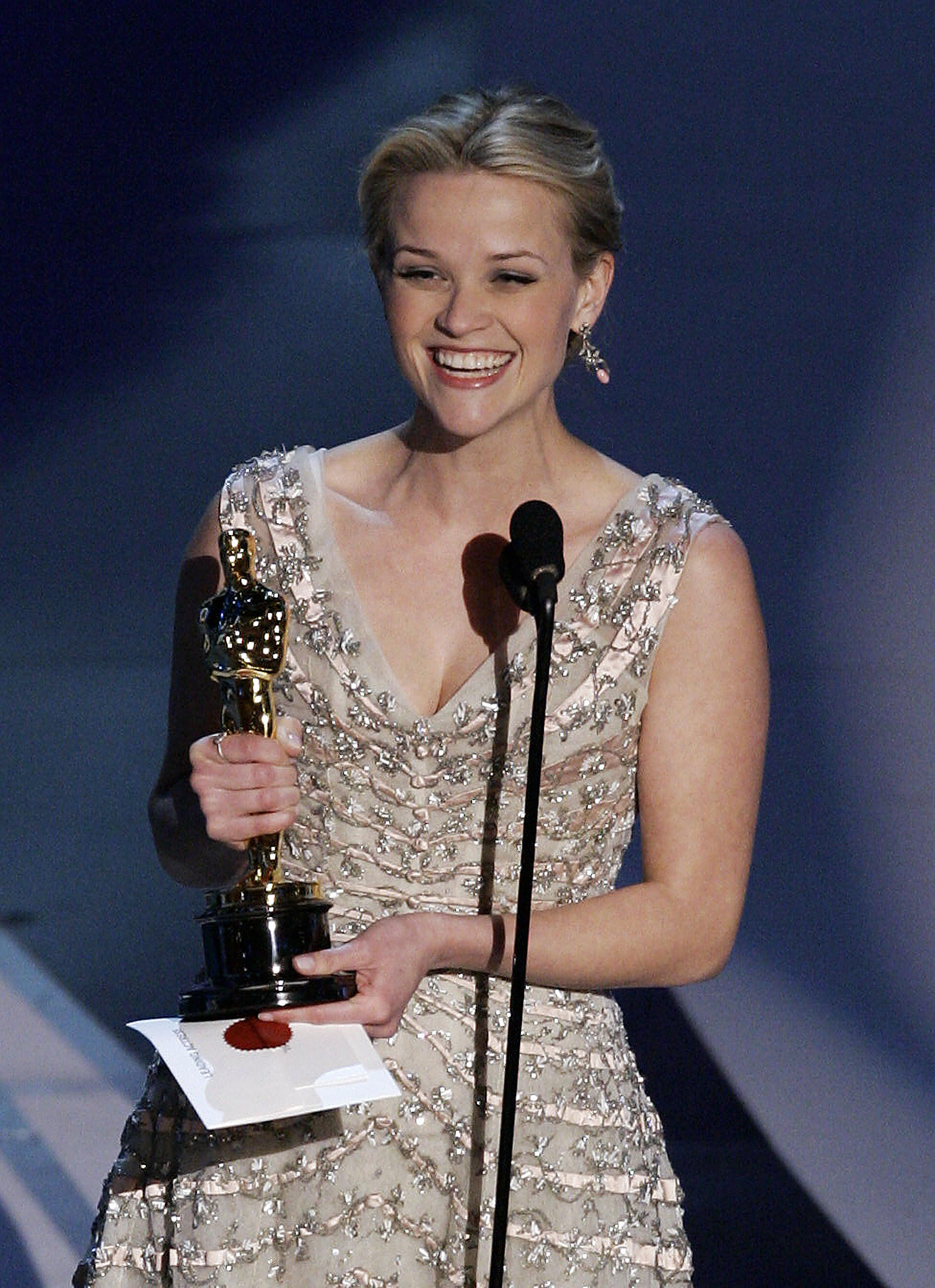 US actress Reese Witherspoon accepts her