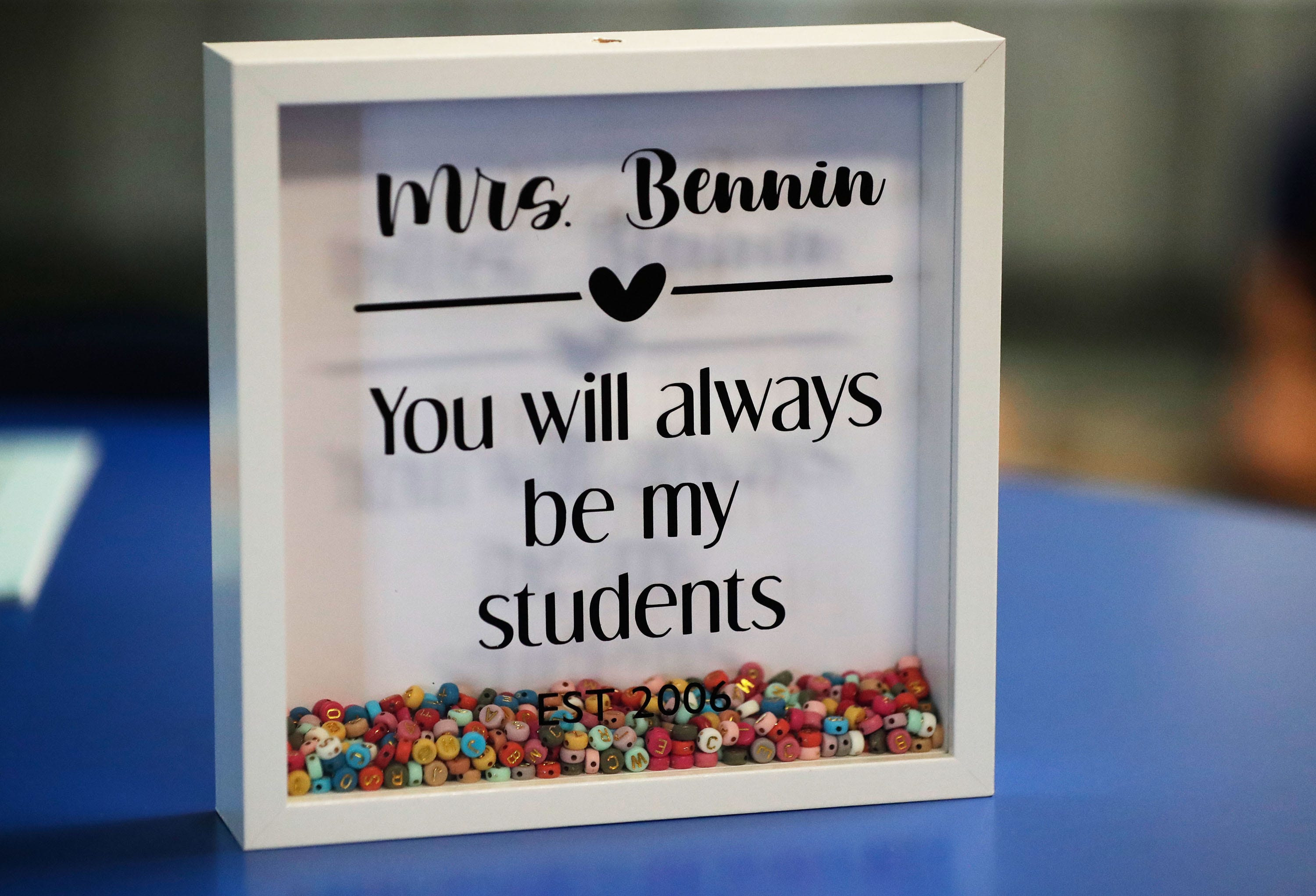 A close-up of the shadow box that Sheboygan Falls first grade teacher Sarah Bennin created which features beads that represent every single student she has had since 2006. Pictured Oct. 6, 2026, in…