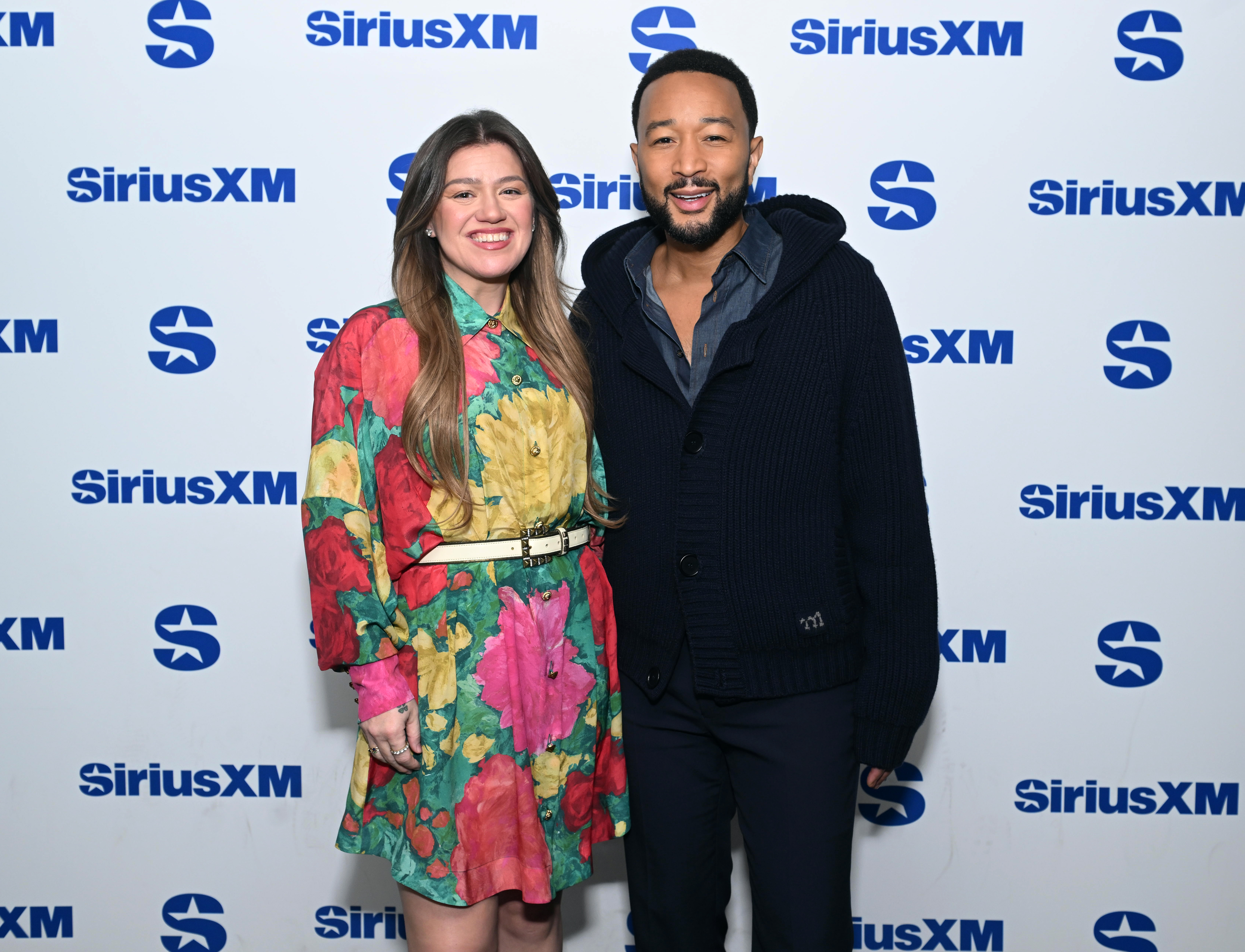 Click to open the image gallery SiriusXM's Front Row Series With The Voice's Kelly Clarkson & John Legend