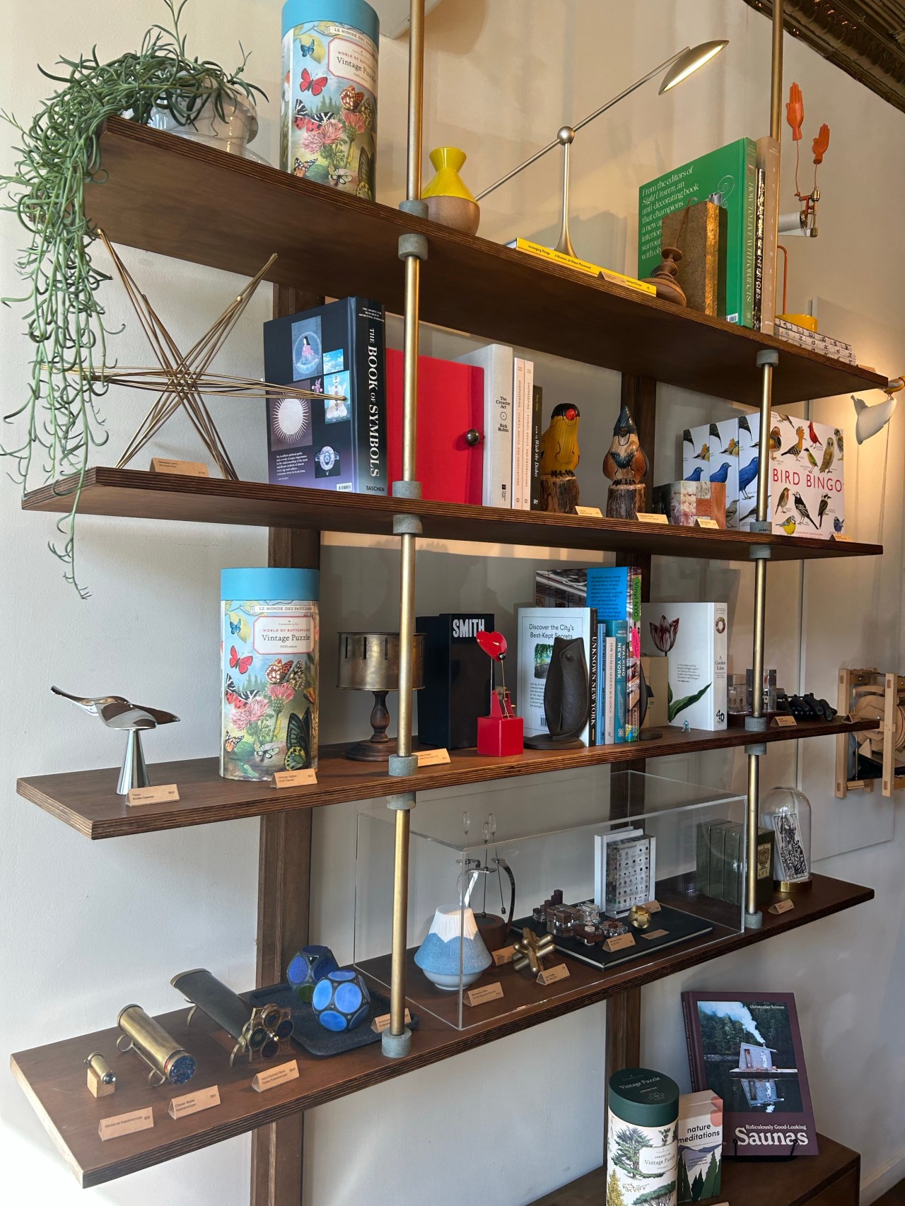 Items on shelves at Art of Play, a shop in Brooklyn, NY, at the center of a dispute with Kelly Clarkson, pictured Oct. 13, 2026. Clarkson visited the store on Oct. 10 and claimed a store employee t… (